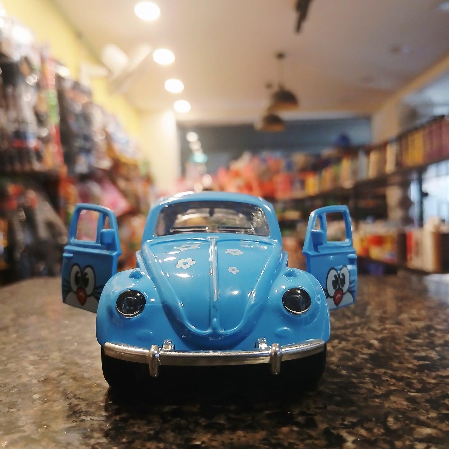 Cartoon Style Beetle Toy Car – Blue with Opening Doors & Funny Eyes
