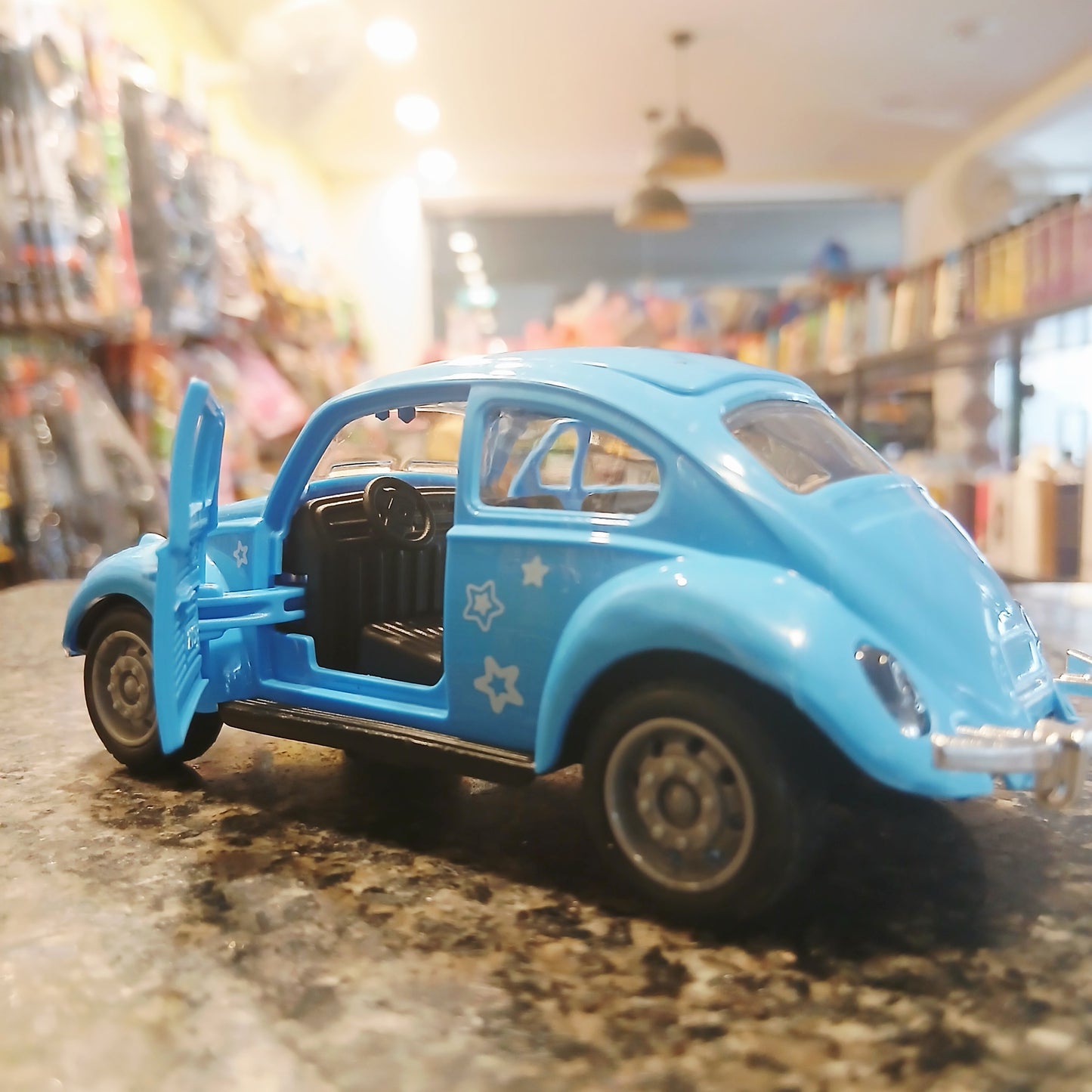 Cartoon Style Beetle Toy Car – Blue with Opening Doors & Funny Eyes