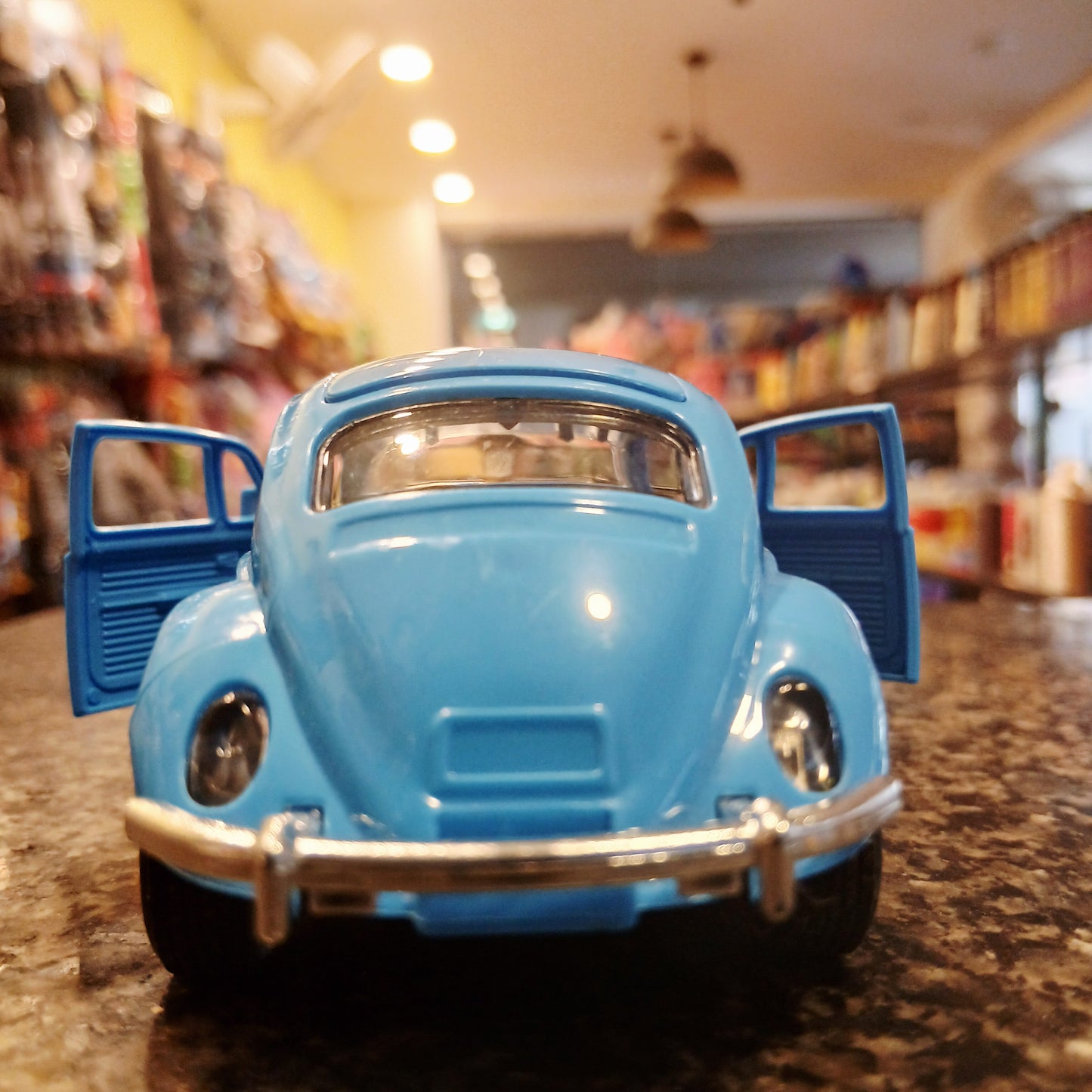 Cartoon Style Beetle Toy Car – Blue with Opening Doors & Funny Eyes