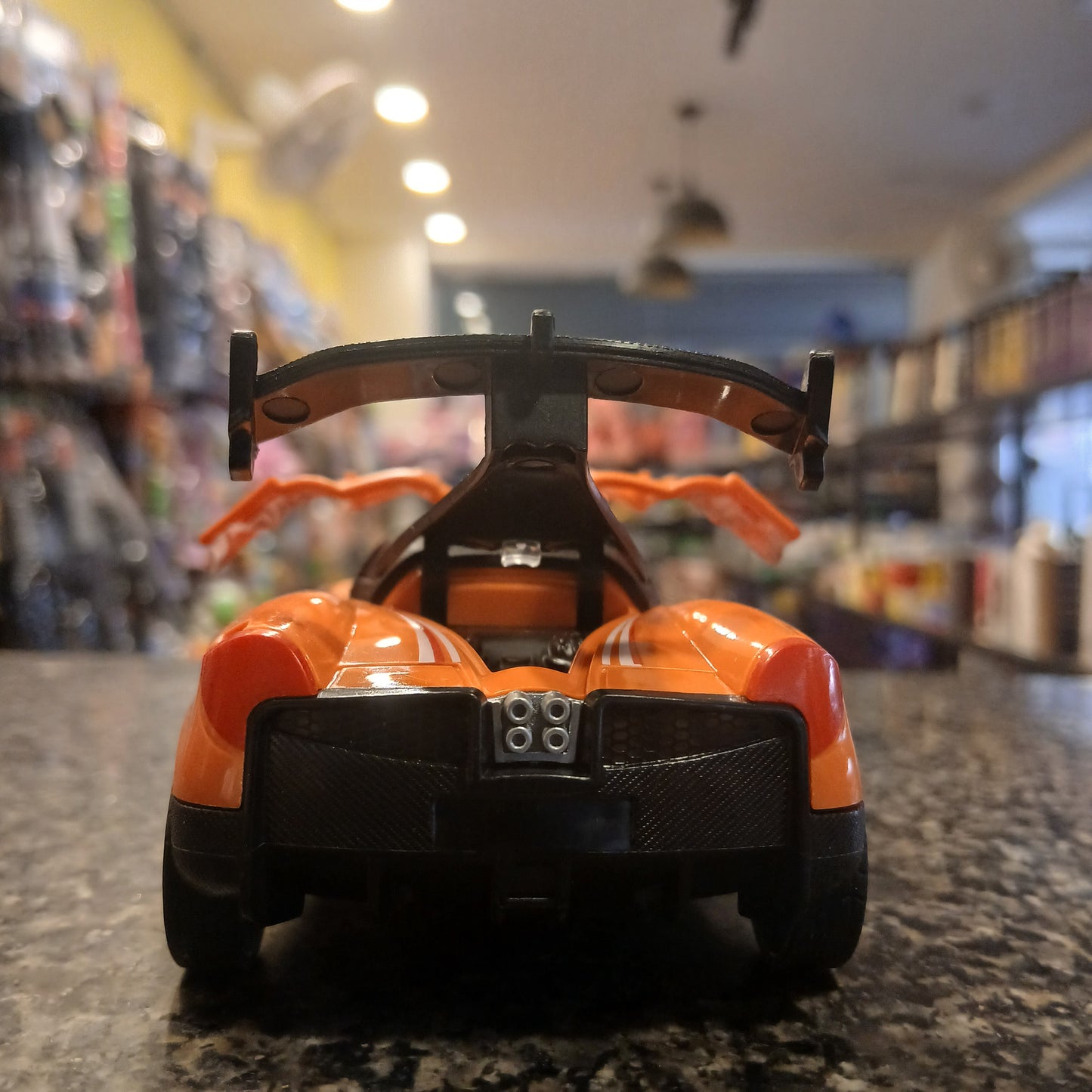 Hot Racing Die-Cast Toy Car – Orange Sports Car with Butterfly Doors