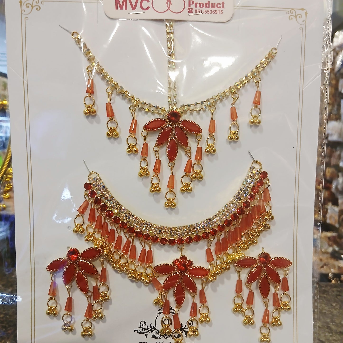 Elegant Golden Pearl Necklace Set with Bindiya– Red & White Pearls with Matching Earrings