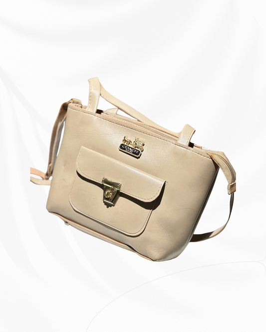 Classic Beige Handbag with Front Pocket & Gold Detailing